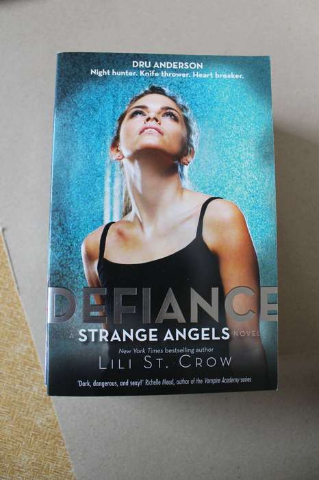 STRANGE ANGELS SERIES  Four titles: Strange Angels, Jealousy, Defiance and Reckoning by Lili St Crow