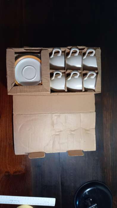 6 DEMITASSE STONE WARE CUPS AND SAUCERS PLUS 1 ESPRESSO COFFEE POT.