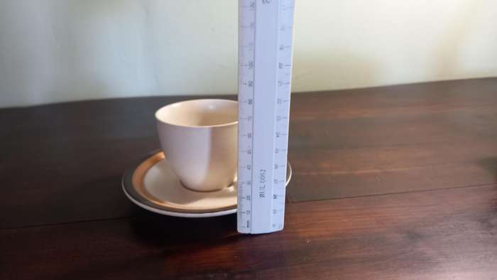 6 DEMITASSE STONE WARE CUPS AND SAUCERS PLUS 1 ESPRESSO COFFEE POT.