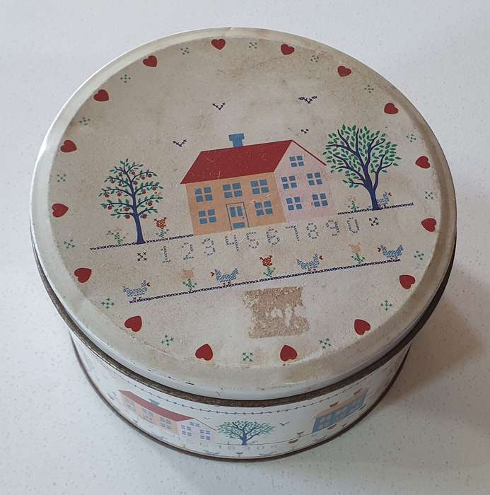 CROSS STITCH tin as per photo.