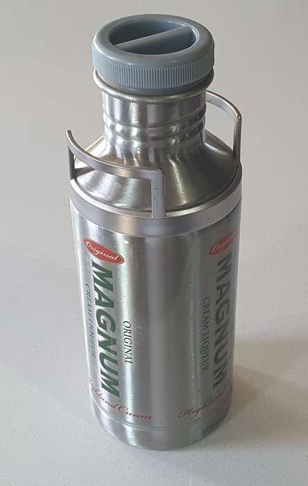 MAGNUM LIQUEUR tin as per photos