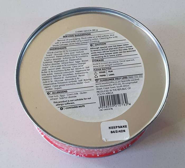 Red WOOLWORTHS tin as per photo