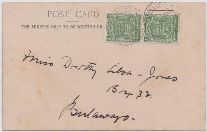 Rhodesia BSAC 1907 1/2d pair  tied with Livingstone b&w p/p/card  of family/community photovery fine