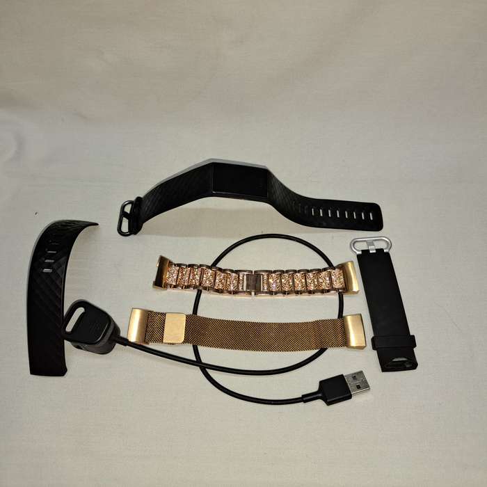 Advance Fitbit Tracker + GPS  Watch - FCCID XRAFB417