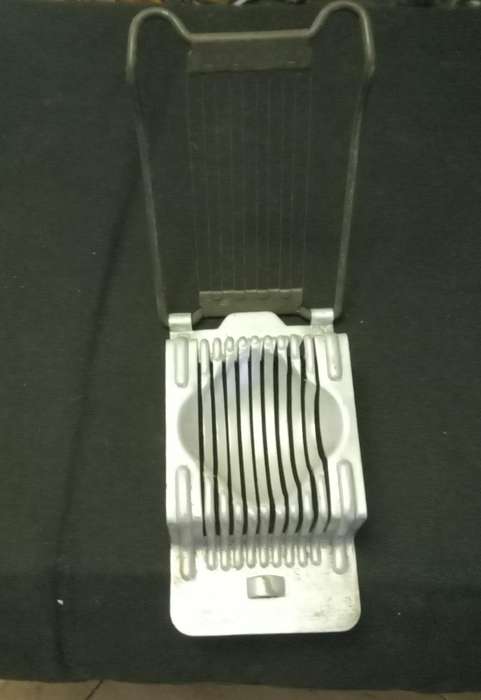 Antique egg slicer