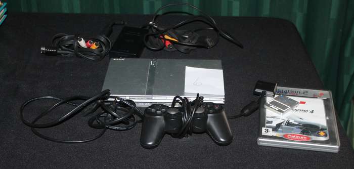 PlayStation 2 Slim with Remote, Game Cables and memory card