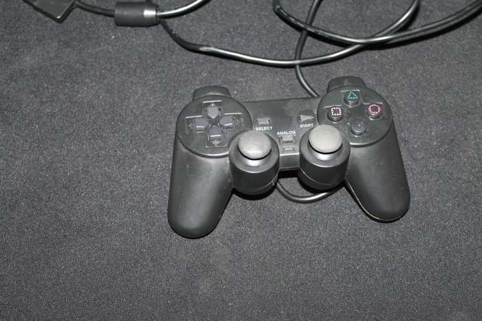 PlayStation 2 Slim with Remote, Game Cables and memory card