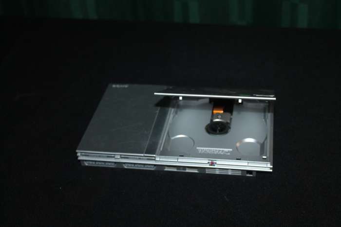 PlayStation 2 Slim with Remote, Game Cables and memory card