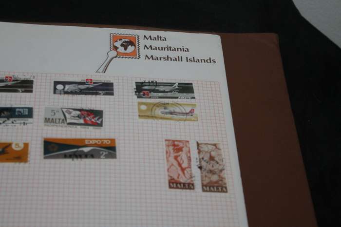 Stamp Album with 300 assorted stamps