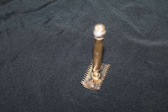 Brass razor