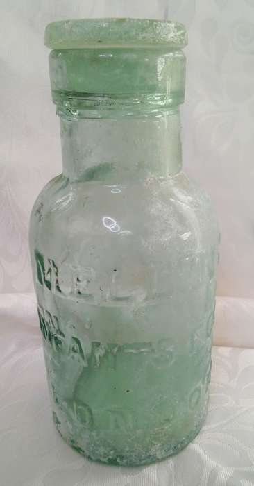 Lovely aqua Mellin's infant food London bottle with original glass lid c1910