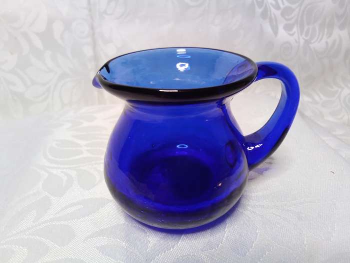 The tiniest vintage cobalt blue jug with crackle glass base