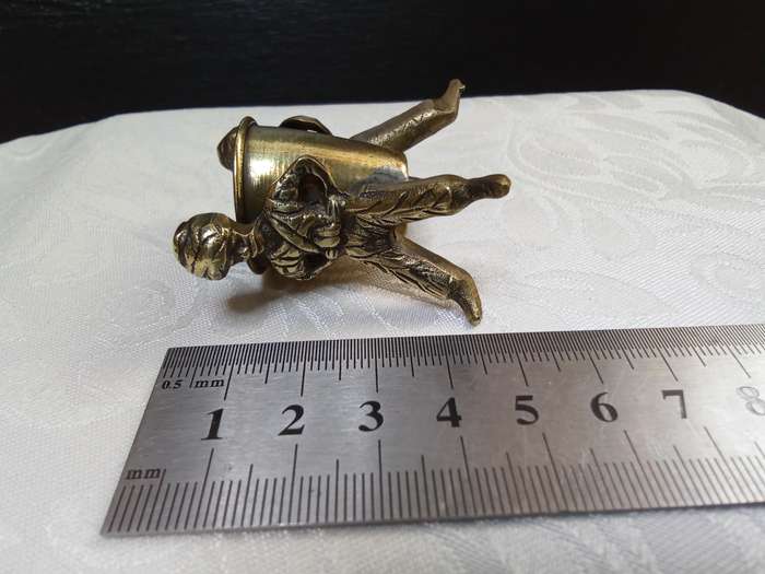 Lovely tiny brass figurine of two hardworking men