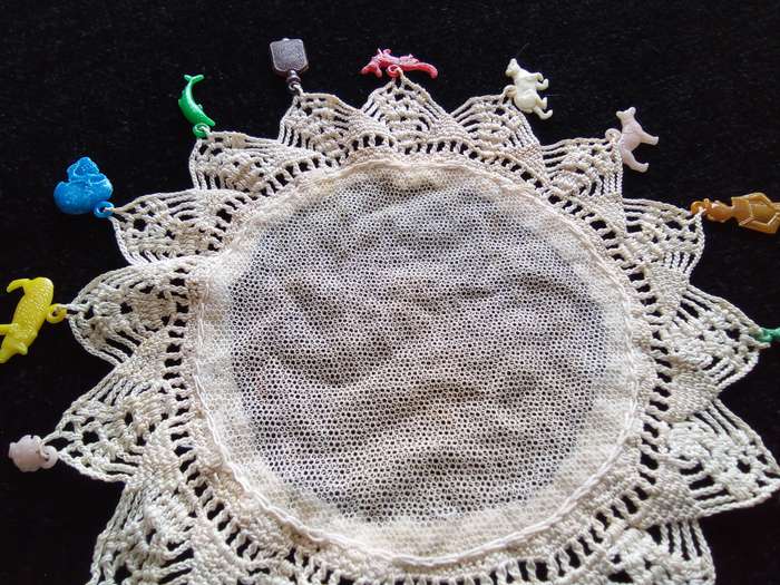 Stunning vintage doily with luckypacket charms!