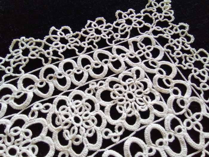 Exquisite white tatted doily