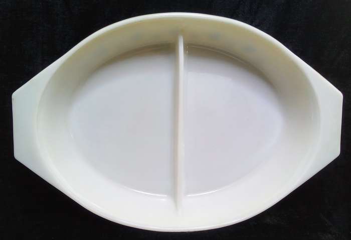 Charming vintage Pyrex Gaiety snowflake lemon yellow oval divided casserole dish