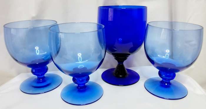 Four beautiful vintage cobalt blue glasses