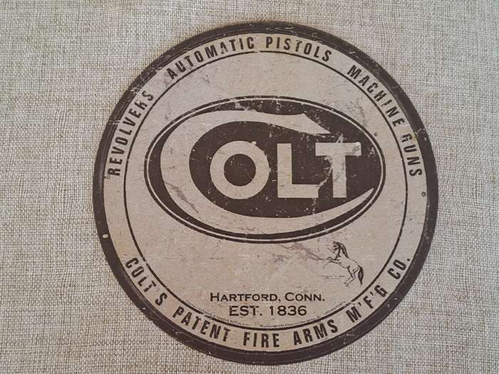 Colt Revolvers, Automatic Pistols, Machine Guns - Circular Advertising Tin Plate Sign