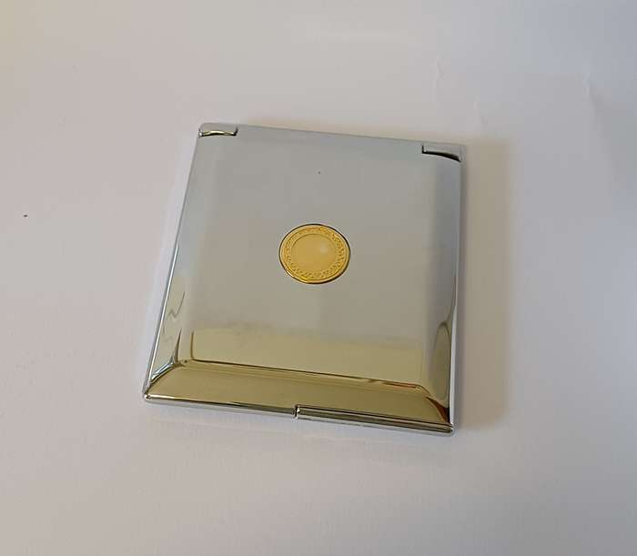 make-up mirror in chrome casing