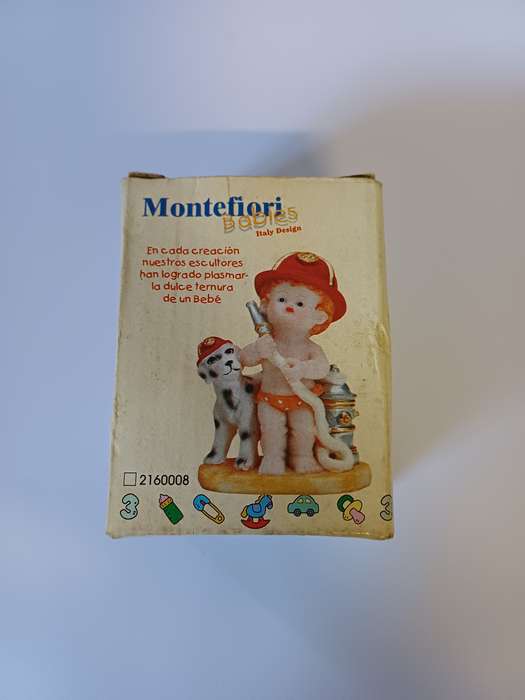 Montefiori Babies Figurine - Firefighter Baby with Dalmatian Dog