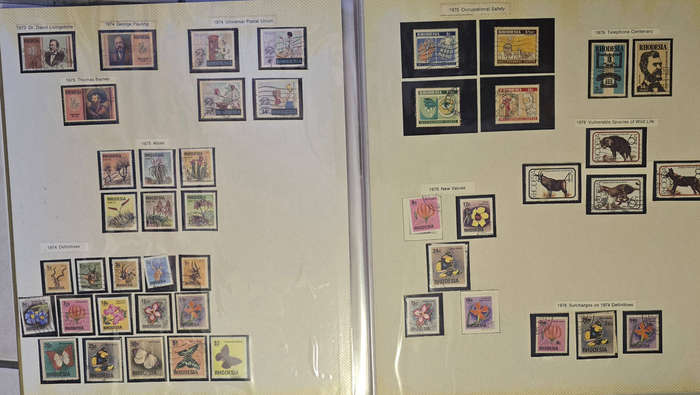 Rhodesia stamp lot with roya re album