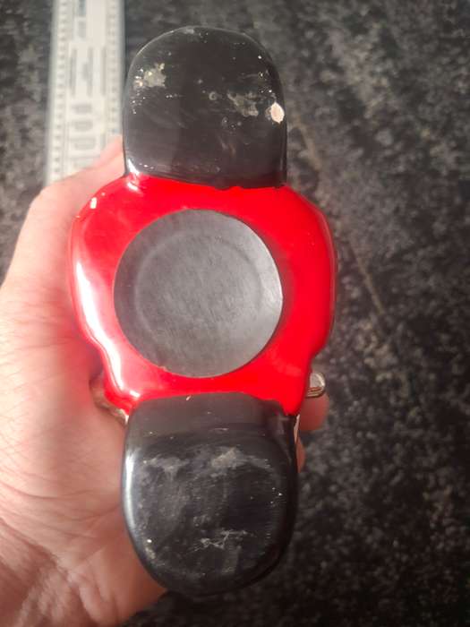 Red piggy bank motorbike