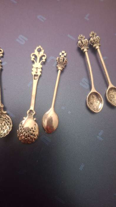 Small ornamental spoons x 8