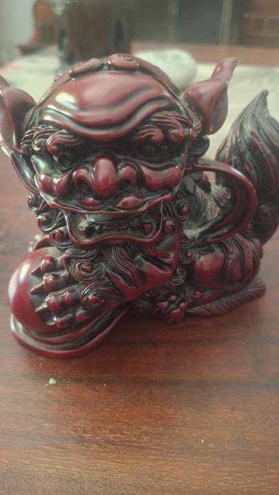 Chinese Carved Red Resin Foo Dogs