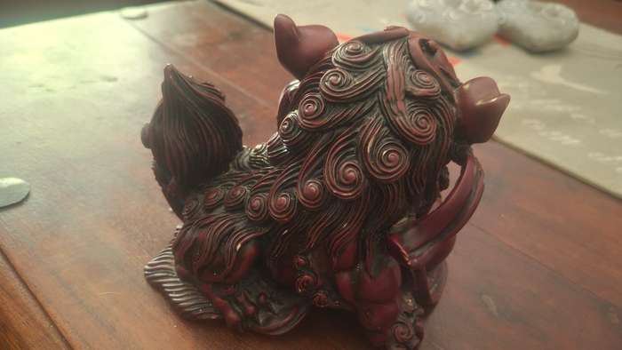 Chinese Carved Red Resin Foo Dogs