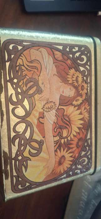 Lennon vintage tin
