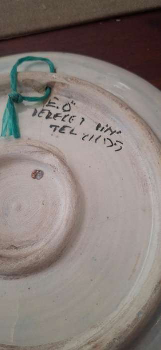 Hand-painted ceramic plate, likely of Greek origin, as indicated by the inscripti