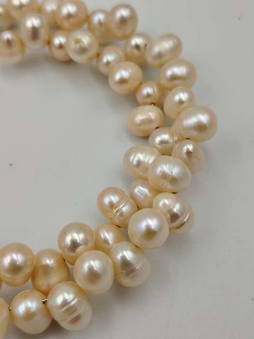 Slight pink genuine pearl wrap around bracelet