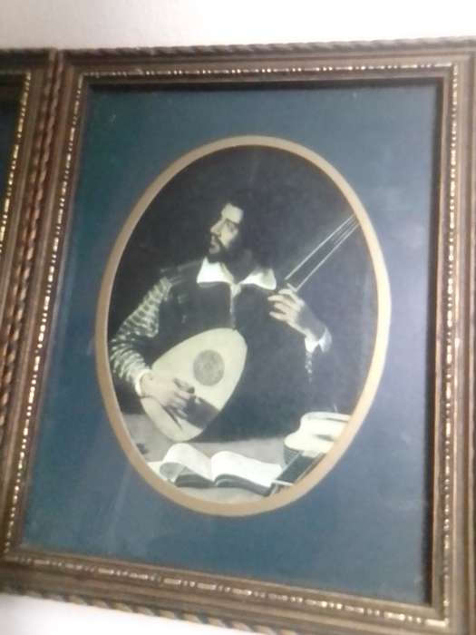 Medallion Wall Arts. Men at High finance and a musician earning his keep.