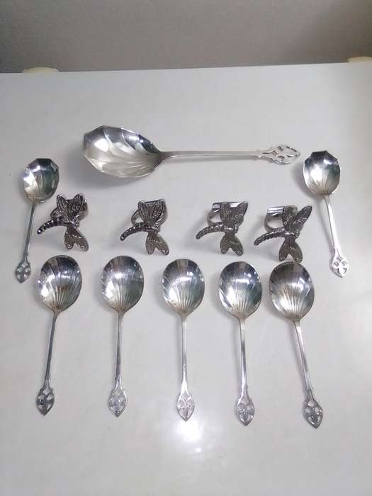 8 Grape fruit spoon set and 4 butterfly napkin rings