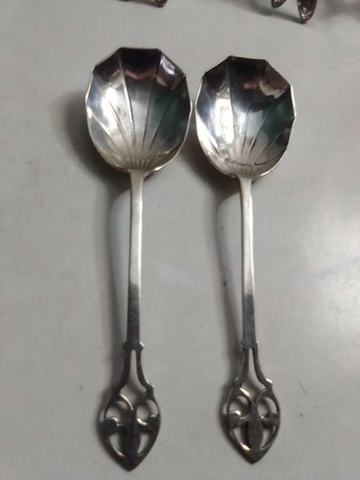 8 Grape fruit spoon set and 4 butterfly napkin rings