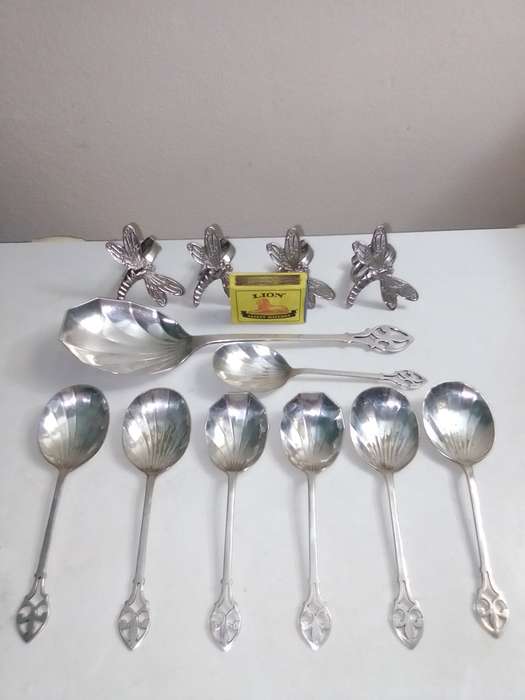 8 Grape fruit spoon set and 4 butterfly napkin rings
