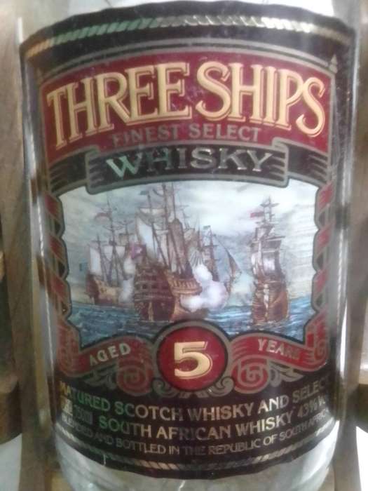 Vintage empty Three Ships 5 year old Scotch whisky  on Cannon framework.