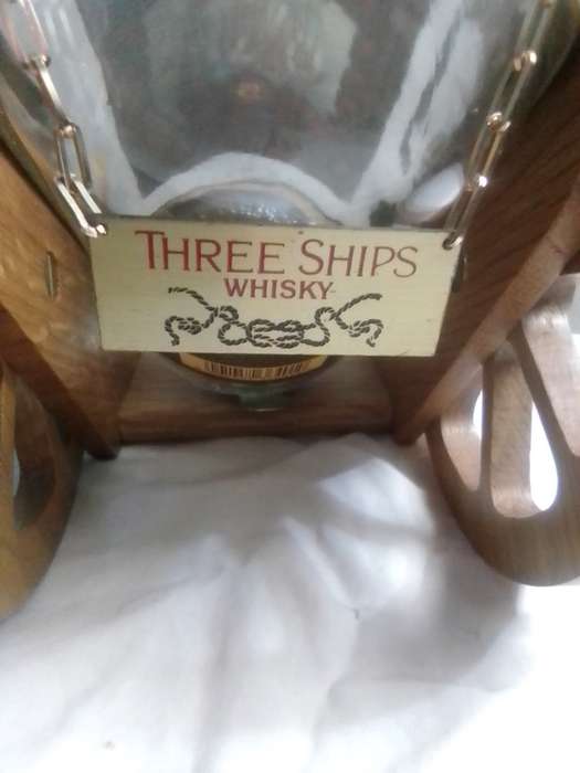 Vintage empty Three Ships 5 year old Scotch whisky  on Cannon framework.