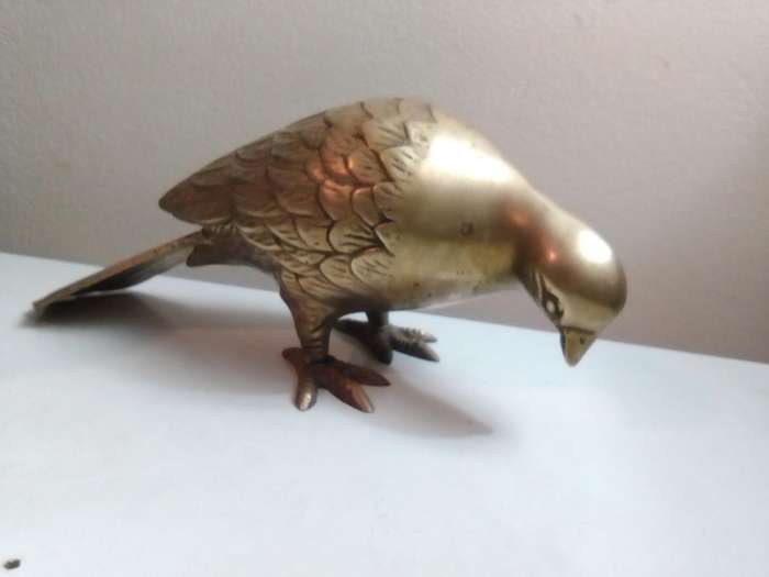 A Vintage pair of heavy brass Doves or Pigeons weighing combined at 2 Kg's in good condition.