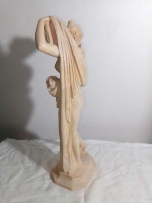 A Large Vintage Stamped: A Santini. A Greek bathing Lady with towel statue. 40,5cm Tall