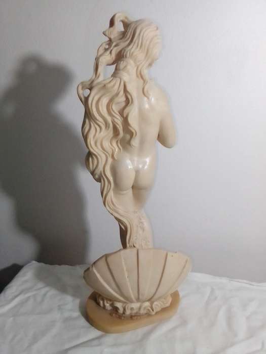 Vintage large nude Greek Lady in a shell. Stamped: A Santini on the shell. 42cm Tall