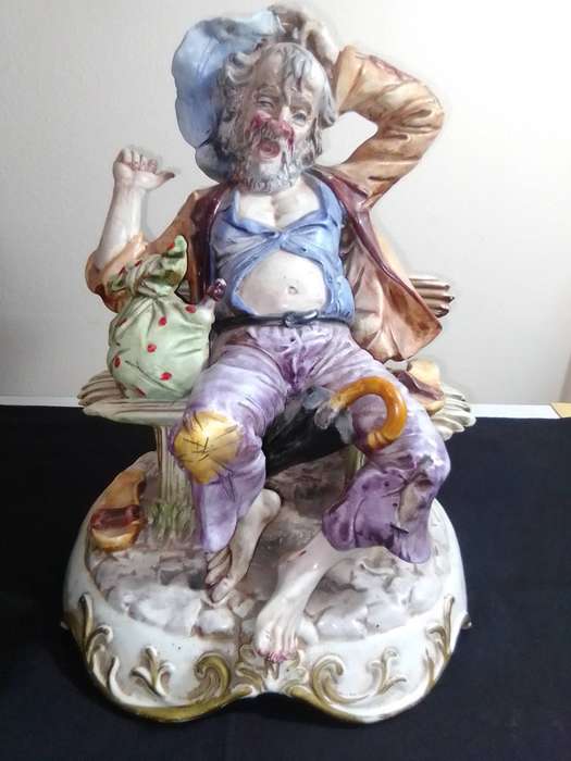 Large Vintage and heavy, Capodimonte Beggar man with umbrella + bag and floppy shoes.