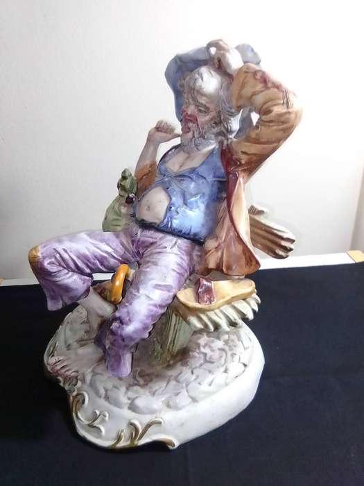 Large Vintage and heavy, Capodimonte Beggar man with umbrella + bag and floppy shoes.