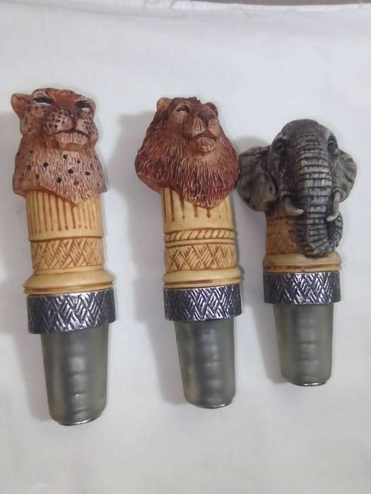 Vintage Big Five bottle stoppers. Their seal's are constructed from food-grade quality silicone.