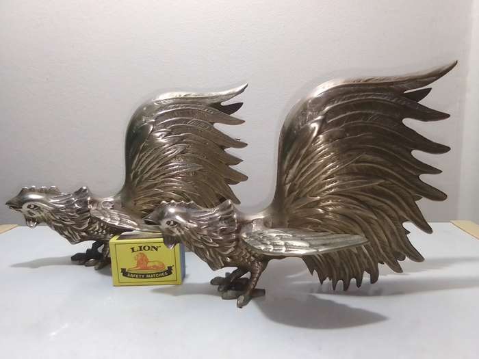 1950's Large Vintage pair of brass fighting roosters. This pair is fierce! Solid heavy cast Brass.