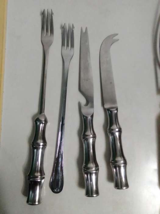 Bar set. Tool's and assorted forks. Cheese Knife and 2 Pickel forks plus bottle opener.