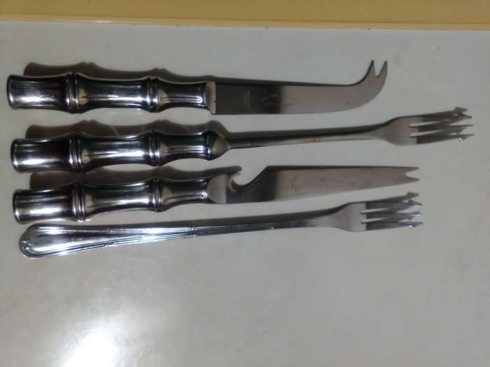 Bar set. Tool's and assorted forks. Cheese Knife and 2 Pickel forks plus bottle opener.