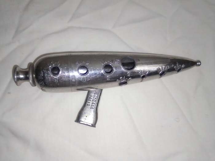 1890-1930 Antique Nickel plated. Wind instrument "UllMann" PARIS. FRENCH METAL CAST OCARINA