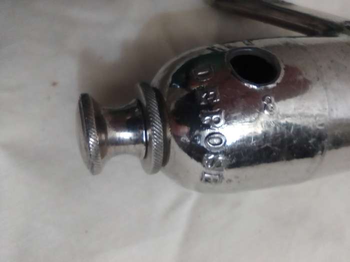 1890-1930 Antique Nickel plated. Wind instrument "UllMann" PARIS. FRENCH METAL CAST OCARINA