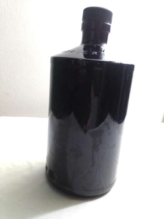2 x empty Hendricks Gin  dark cobalt blue bottles. Introduced in 1999.